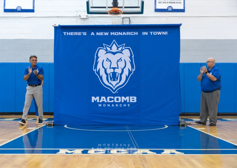 The words Macomb Monarchs with a lion logo